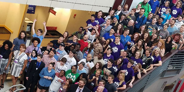 Central Ohio United Non-Theists BBN team volunteering at Secular Student Assembly conference - photo from above of many students gathered in corridor. BBN picture of the month July 2017