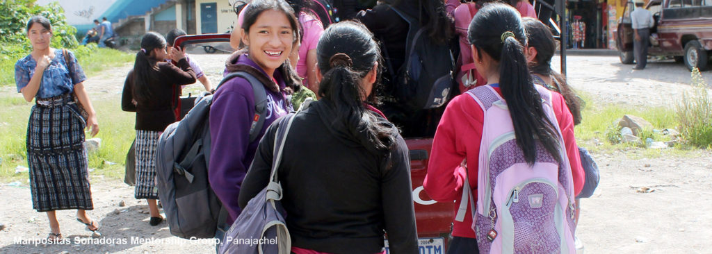 Landscape banner photo of young girl students with backpacks, smiling and talking - Starfish One by One Humanist grants beneficiary