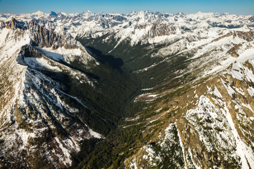 LightHawk aerial photo of snowcapped mountains and headwaters of Methow River in Washington